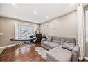 16 Taraglen Road Ne, Calgary, AB  - Indoor Photo Showing Living Room 