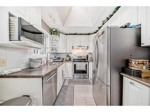 16 Taraglen Road Ne, Calgary, AB - Indoor Photo Showing Kitchen