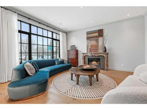 82 Valour Circle Sw, Calgary, AB - Indoor Photo Showing Living Room With Fireplace