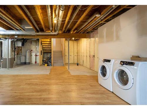 80 Evansridge View Nw, Calgary, AB - Indoor Photo Showing Laundry Room