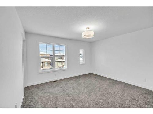 1115 Chinnok Winds Circle Sw, Airdrie, AB - Indoor Photo Showing Other Room