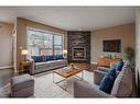 826 Copperfield Boulevard Se, Calgary, AB  - Indoor Photo Showing Living Room With Fireplace 