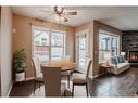 826 Copperfield Boulevard Se, Calgary, AB  - Indoor Photo Showing Dining Room With Fireplace 