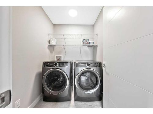 11 Willow Park Point, Cochrane, AB - Indoor Photo Showing Laundry Room