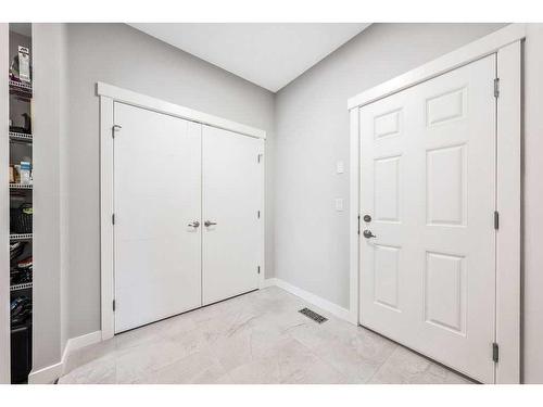 11 Willow Park Point, Cochrane, AB - Indoor Photo Showing Other Room