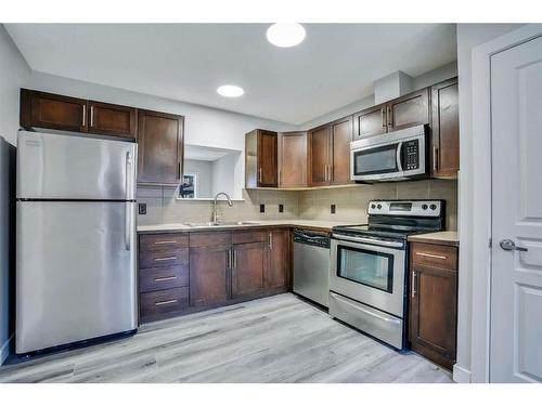 151 Panatella Road Nw, Calgary, AB - Indoor Photo Showing Kitchen