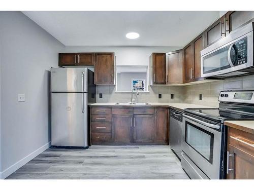 151 Panatella Road Nw, Calgary, AB - Indoor Photo Showing Kitchen