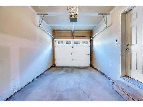 151 Panatella Road Nw, Calgary, AB - Indoor Photo Showing Garage