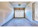 151 Panatella Road Nw, Calgary, AB  - Indoor Photo Showing Garage 