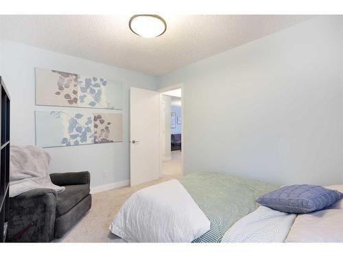 14 Copperstone Drive Se, Calgary, AB - Indoor Photo Showing Bedroom