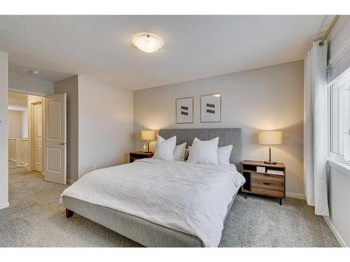 132 Wolf Creek Manor Se, Calgary, AB - Indoor Photo Showing Bedroom