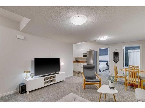 132 Wolf Creek Manor Se, Calgary, AB - Indoor Photo Showing Living Room