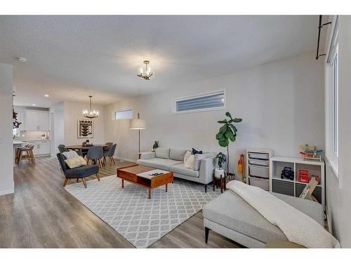 132 Wolf Creek Manor Se, Calgary, AB - Indoor Photo Showing Living Room