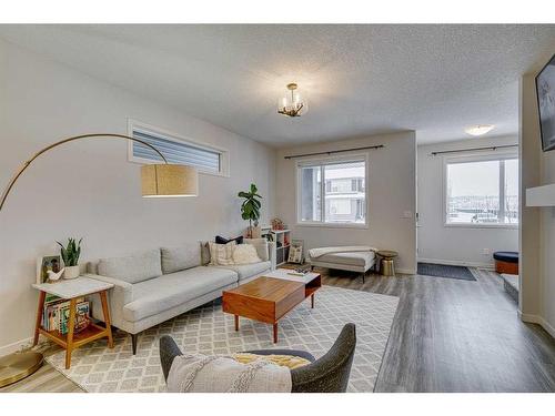 132 Wolf Creek Manor Se, Calgary, AB - Indoor Photo Showing Living Room