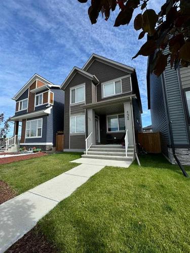 132 Wolf Creek Manor Se, Calgary, AB - Outdoor With Facade