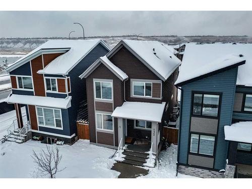 132 Wolf Creek Manor Se, Calgary, AB - Outdoor With Facade