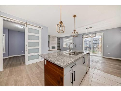 107 Legacy Landing Se, Calgary, AB - Indoor Photo Showing Kitchen With Double Sink