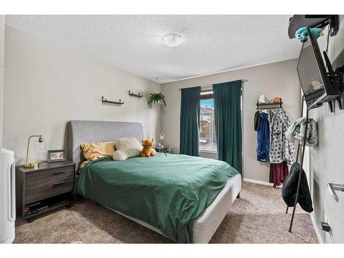 163 Chapalina Square Se, Calgary, AB - Indoor Photo Showing Bedroom