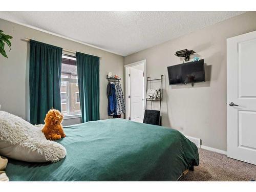 163 Chapalina Square Se, Calgary, AB - Indoor Photo Showing Bedroom