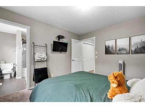 163 Chapalina Square Se, Calgary, AB - Indoor Photo Showing Bedroom