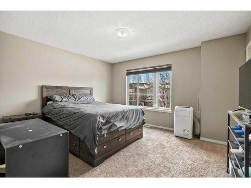 163 Chapalina Square Se, Calgary, AB - Indoor Photo Showing Bedroom