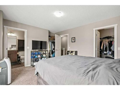 163 Chapalina Square Se, Calgary, AB - Indoor Photo Showing Bedroom