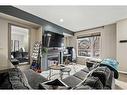 163 Chapalina Square Se, Calgary, AB  - Indoor Photo Showing Living Room With Fireplace 