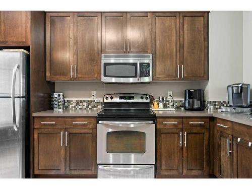 163 Chapalina Square Se, Calgary, AB - Indoor Photo Showing Kitchen