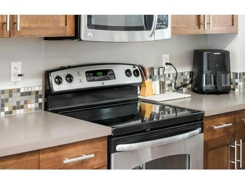 163 Chapalina Square Se, Calgary, AB - Indoor Photo Showing Kitchen