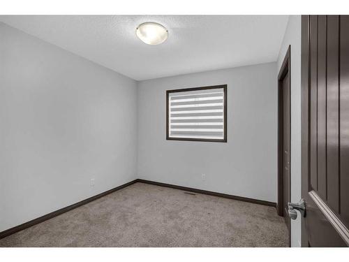 1121 Kingston Crescent Se, Airdrie, AB - Indoor Photo Showing Other Room