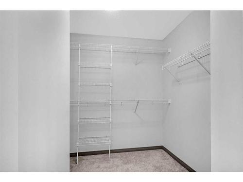 1121 Kingston Crescent Se, Airdrie, AB - Indoor With Storage