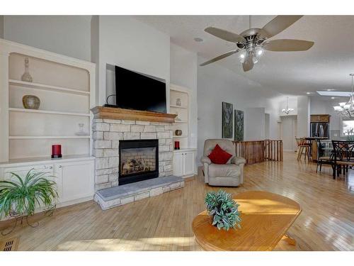 355 New Brighton Place Se, Calgary, AB - Indoor Photo Showing Living Room With Fireplace