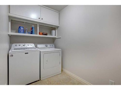 355 New Brighton Place Se, Calgary, AB - Indoor Photo Showing Laundry Room