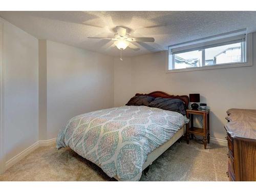 355 New Brighton Place Se, Calgary, AB - Indoor Photo Showing Bedroom