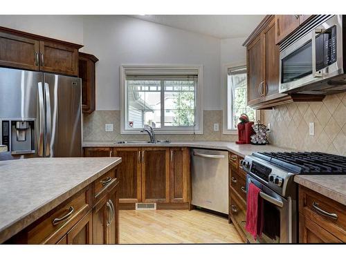 355 New Brighton Place Se, Calgary, AB - Indoor Photo Showing Kitchen With Stainless Steel Kitchen With Double Sink