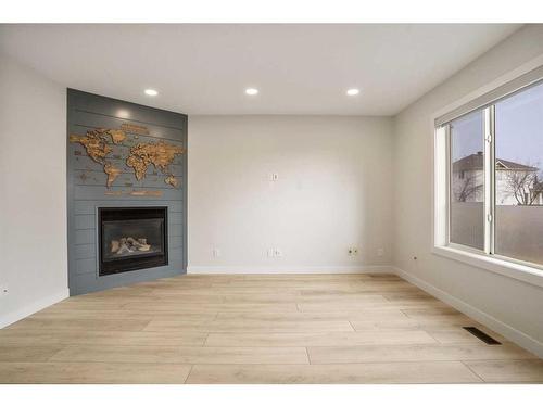 276 Royal Birch Circle Nw, Calgary, AB - Indoor With Fireplace