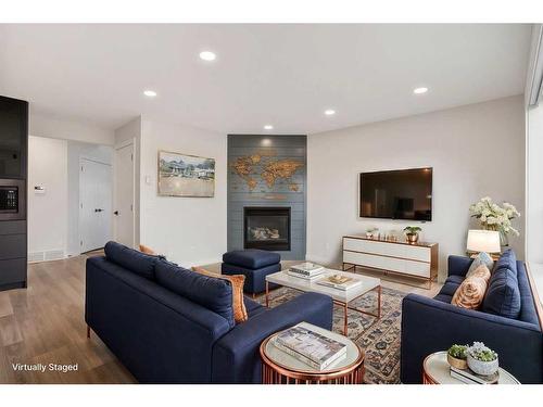 276 Royal Birch Circle Nw, Calgary, AB - Indoor Photo Showing Living Room With Fireplace