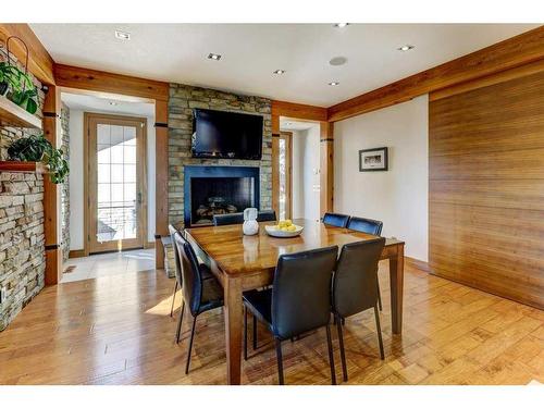 738 Crescent Road Nw, Calgary, AB - Indoor Photo Showing Dining Room With Fireplace