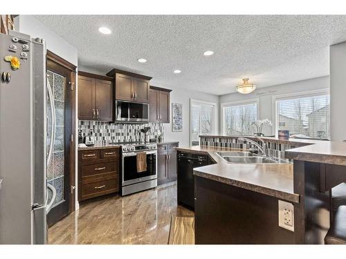 1712 High Park Boulevard Nw, High River, AB - Indoor Photo Showing Kitchen With Stainless Steel Kitchen With Double Sink With Upgraded Kitchen