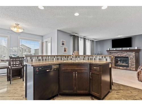 1712 High Park Boulevard Nw, High River, AB - Indoor Photo Showing Other Room With Fireplace