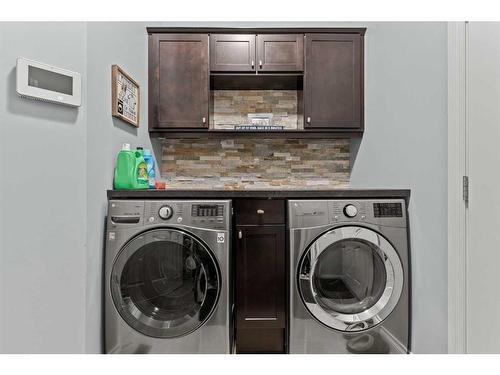 1712 High Park Boulevard Nw, High River, AB - Indoor Photo Showing Laundry Room