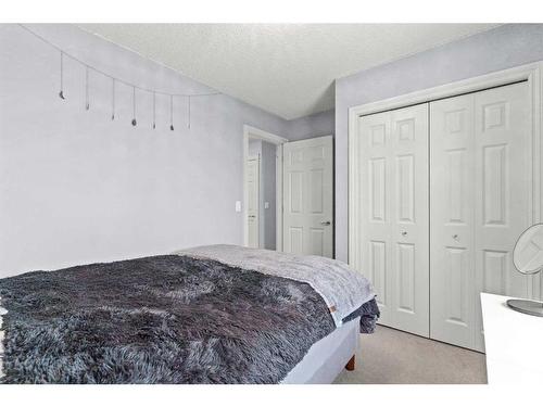 1712 High Park Boulevard Nw, High River, AB - Indoor Photo Showing Bedroom