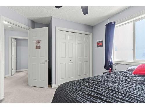 1712 High Park Boulevard Nw, High River, AB - Indoor Photo Showing Bedroom