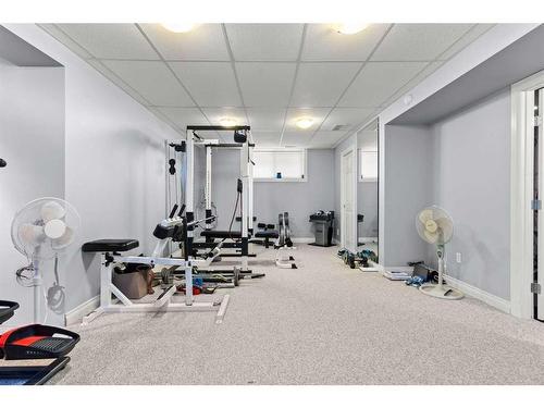 1712 High Park Boulevard Nw, High River, AB - Indoor Photo Showing Gym Room