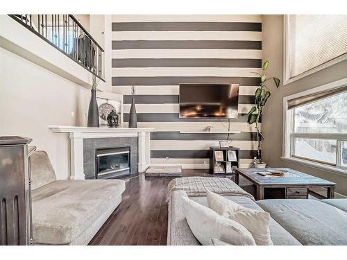 137 Coville Close Ne, Calgary, AB - Indoor Photo Showing Living Room With Fireplace