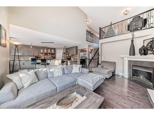 137 Coville Close Ne, Calgary, AB - Indoor Photo Showing Living Room With Fireplace