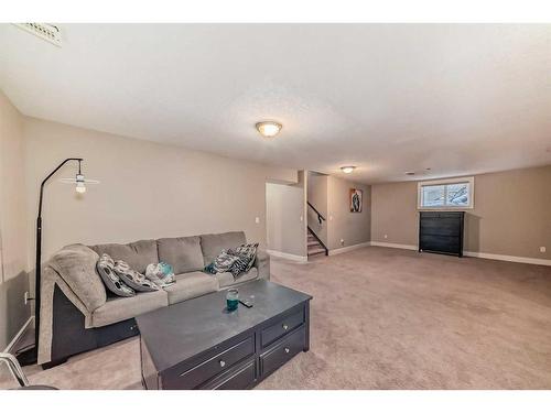 137 Coville Close Ne, Calgary, AB - Indoor Photo Showing Living Room