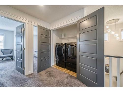 41 Evansfield Manor Nw, Calgary, AB - Indoor Photo Showing Laundry Room