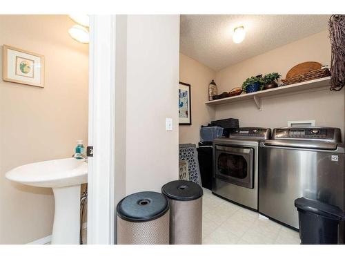 215 Chapalina Place Se, Calgary, AB - Indoor Photo Showing Laundry Room