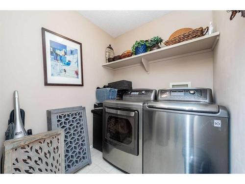 215 Chapalina Place Se, Calgary, AB - Indoor Photo Showing Laundry Room